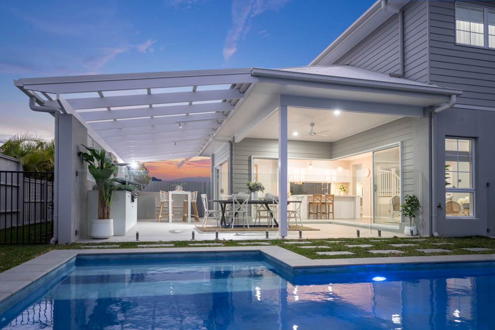 Pool that backs onto entertainment area in late afternoon